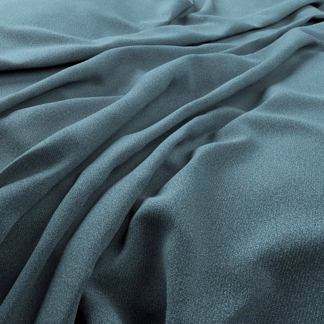 Close view of muted airforce blue fabric with fine grain and fluid folds