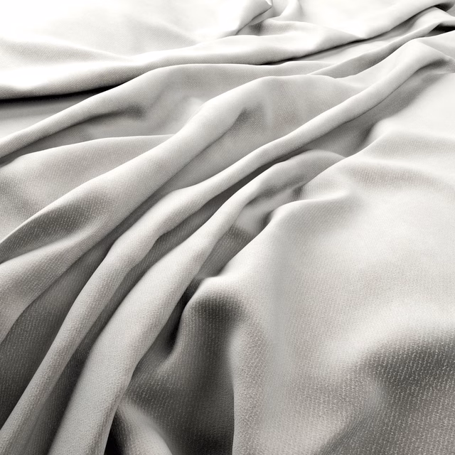 Warm ivory fabric in fluid folds, showing a fine even weave and soft satin sheen