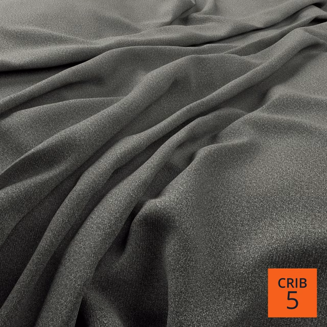 Deep pepper-grey fabric with fine grain texture falling into soft, sculptural folds
