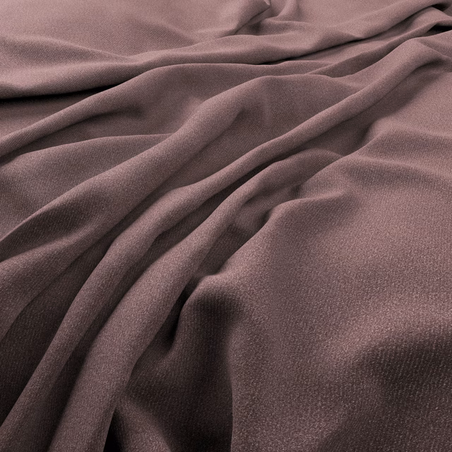 Close-up of softly draped dusty mauve fabric with a fine woven texture