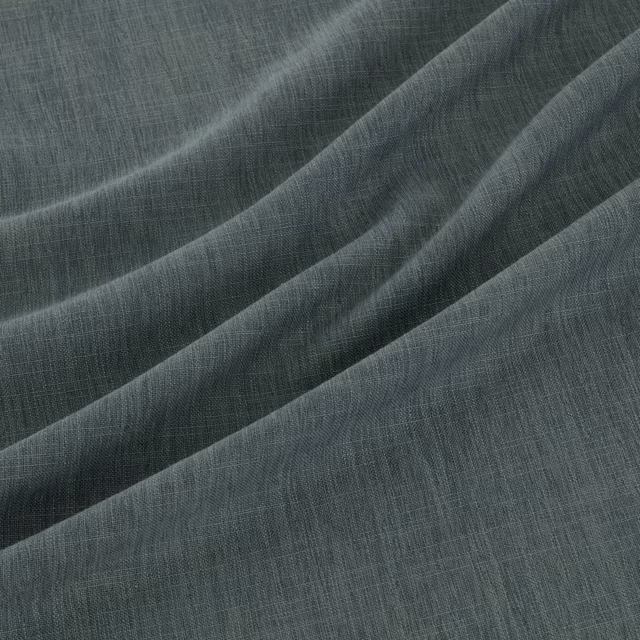 Folded Amalfi Aegean fabric showing deep blue-grey teal and fine woven crosshatching