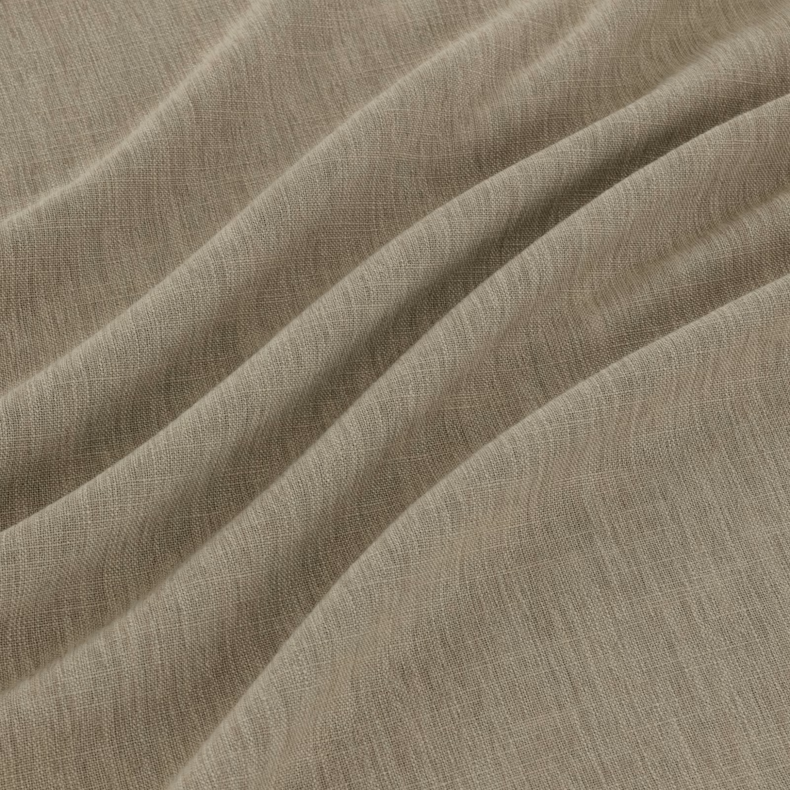Close view of taupe-grey woven cloth falling in soft diagonal folds