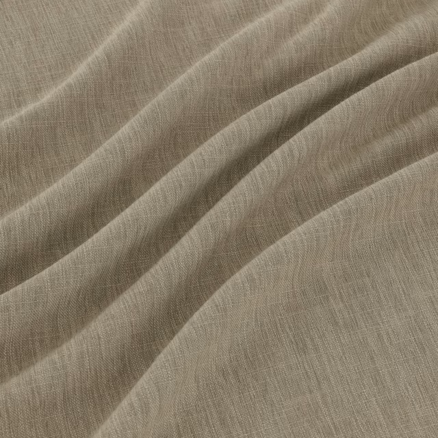 Close view of taupe-grey woven cloth falling in soft diagonal folds