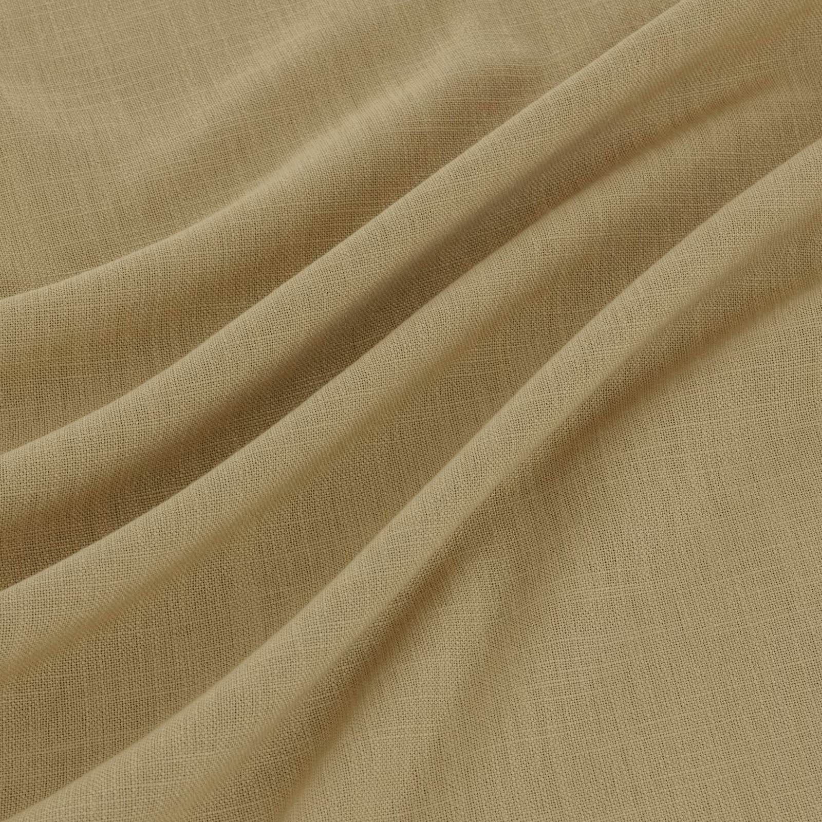 Muted butter-yellow fine weave fabric draped in softly shadowed folds