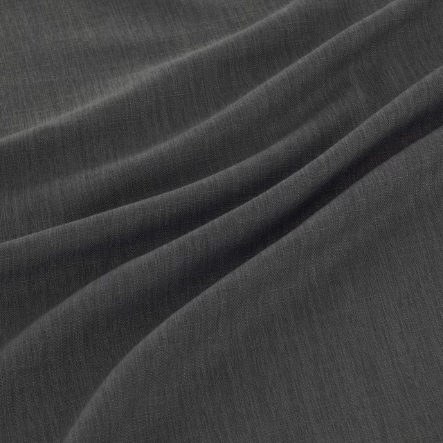 Deep denim blue-grey fabric with fine vertical weave falling into soft folds