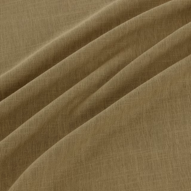 Muted fennel-olive woven fabric with fine crosshatch texture and diagonal folds