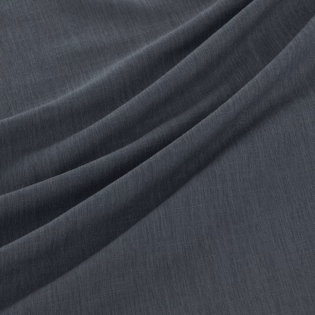 Deep slate-grey plain weave gathered into soft, fluid diagonal folds