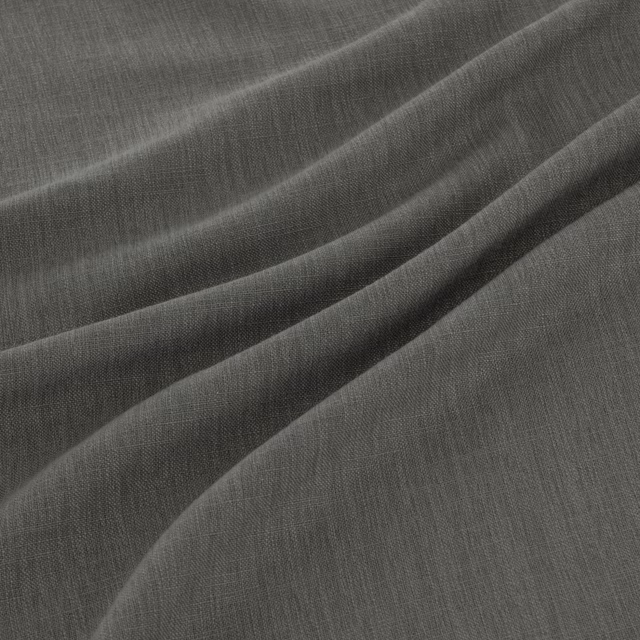 Smoky charcoal-grey fabric with fine vertical weave in soft diagonal folds