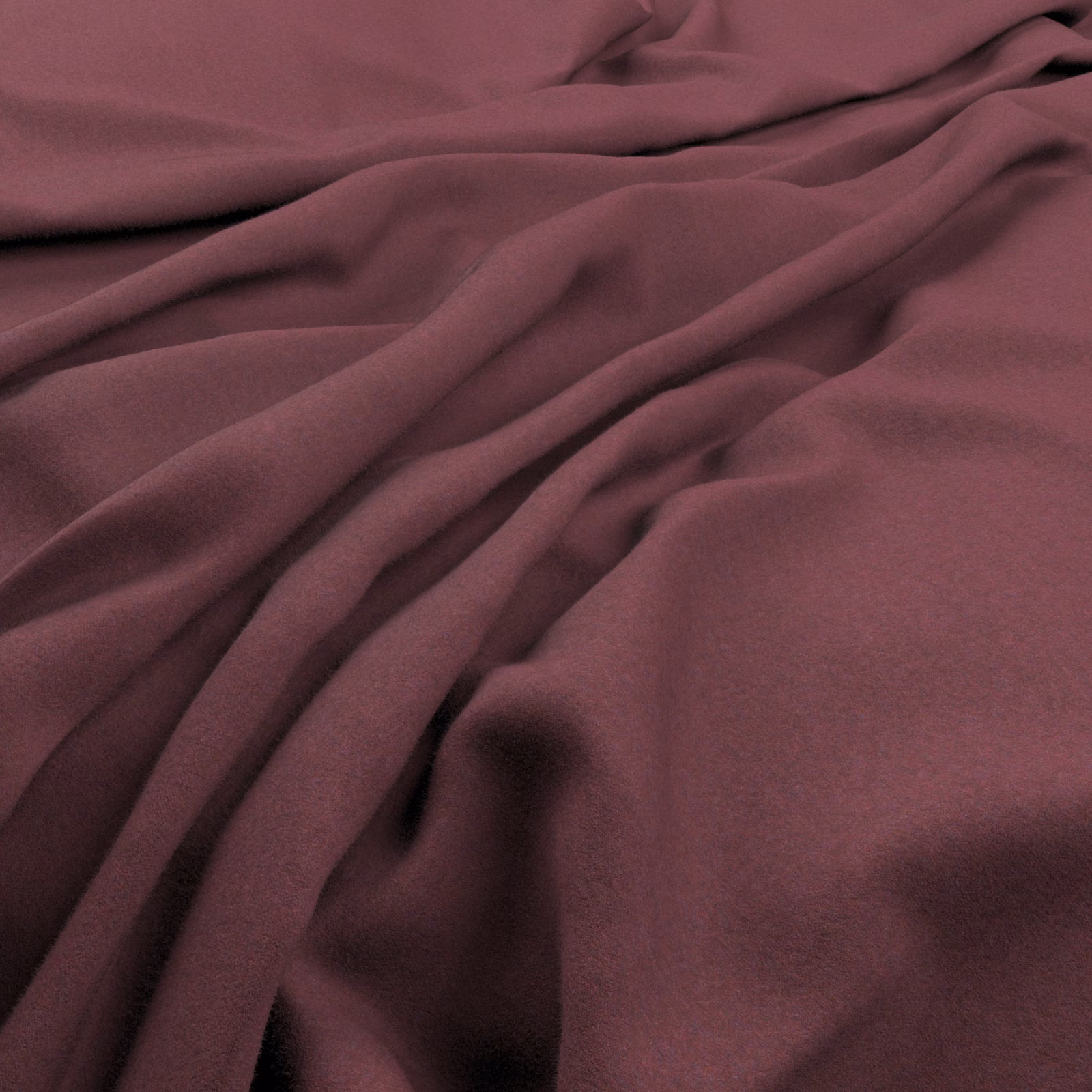Dusky plum fabric falling in soft, fluid folds with a smooth surface