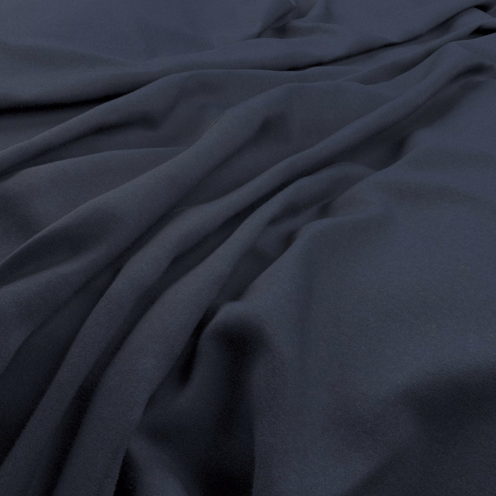 Deep indigo fabric with smooth low-sheen surface gathered into soft folds