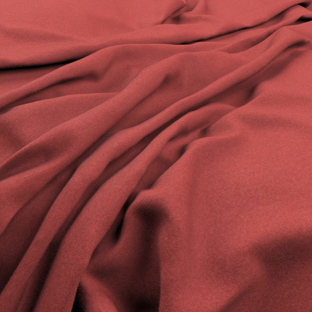 Deep madder-red fabric with a softly brushed surface folding into dark shadows