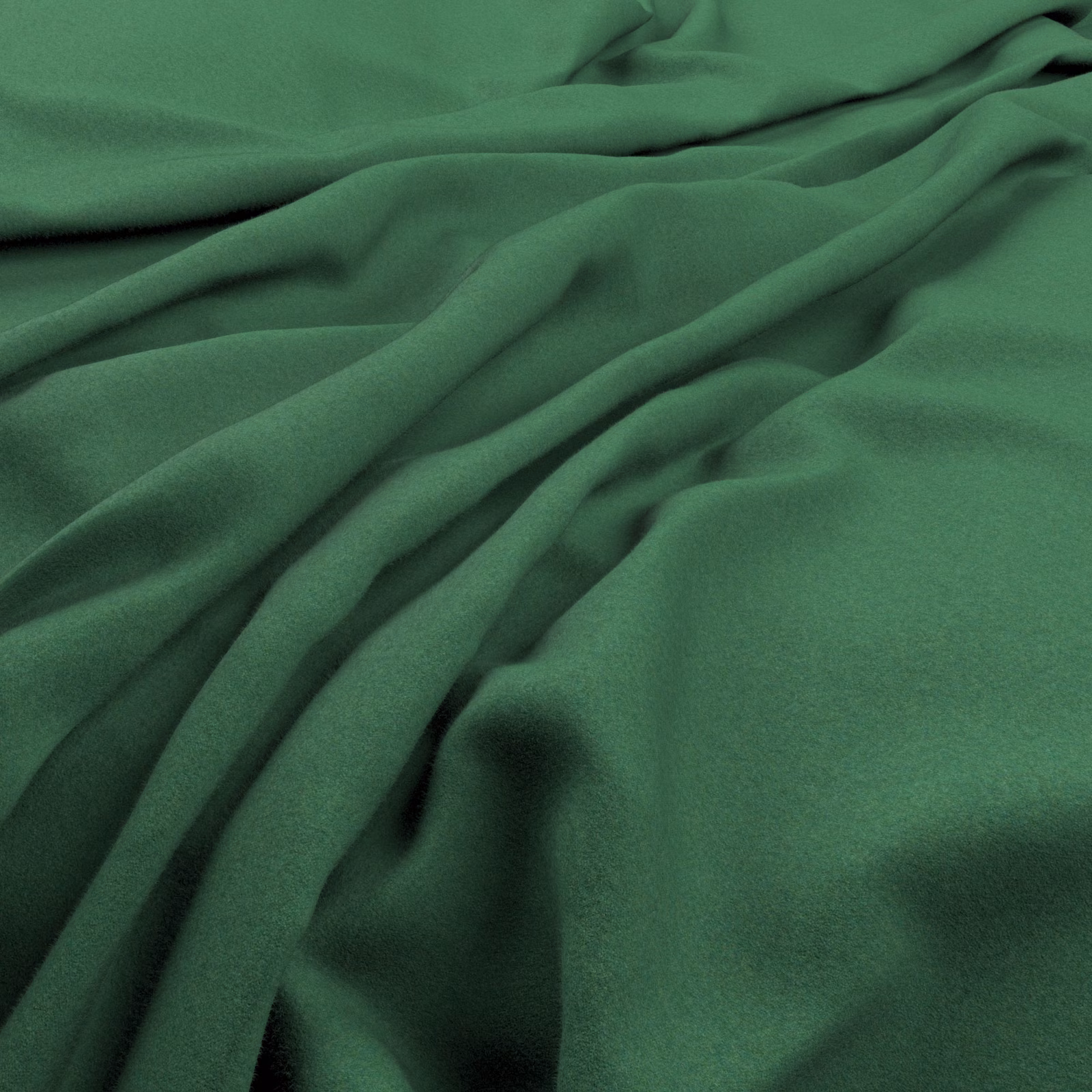 Deep forest green fabric gathered into soft, fluid folds with a matte surface
