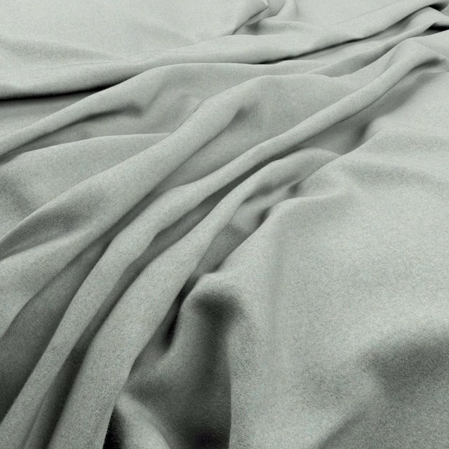 Pale peppermint-green fabric with a soft matte surface gathered into fluid folds