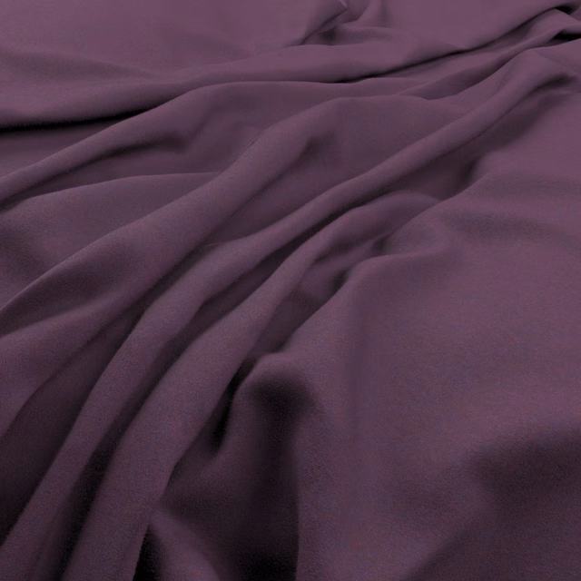 Deep aubergine purple fabric falling in smooth, softly highlighted folds