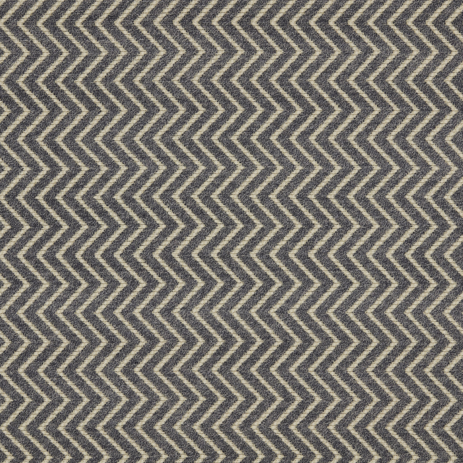 Close-up of graphite chevron upholstery fabric with pale zigzag contrast threads