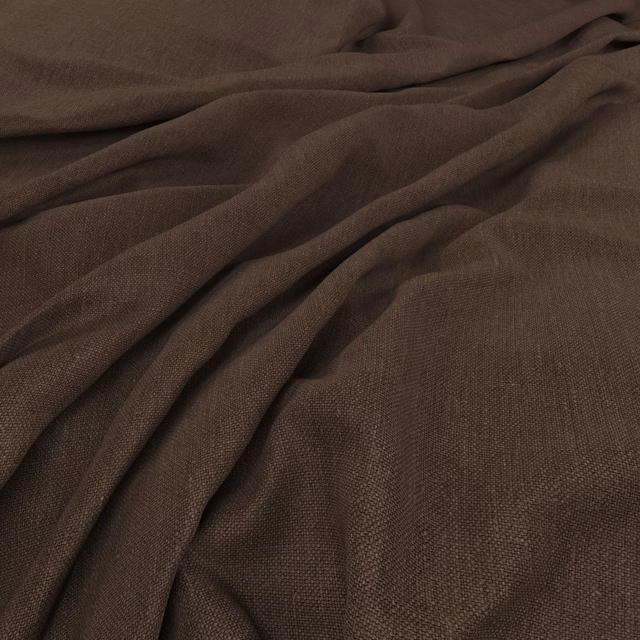 Deep brown-grey plain weave fabric gathered into softly textured flowing folds