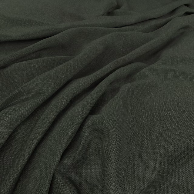 Deep forest-green woven fabric gathered into soft folds with a fine textured surface