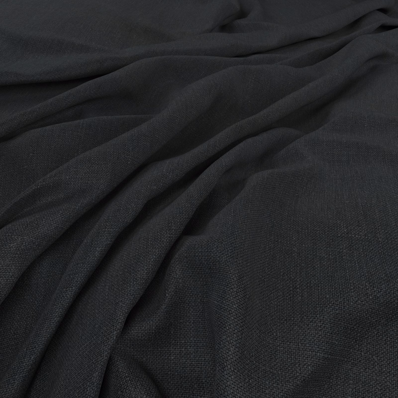 Deep charcoal plain weave fabric gathered into softly lit, fluid folds