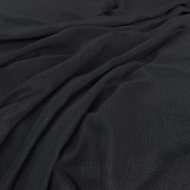 Deep charcoal plain weave fabric gathered into softly lit, fluid folds