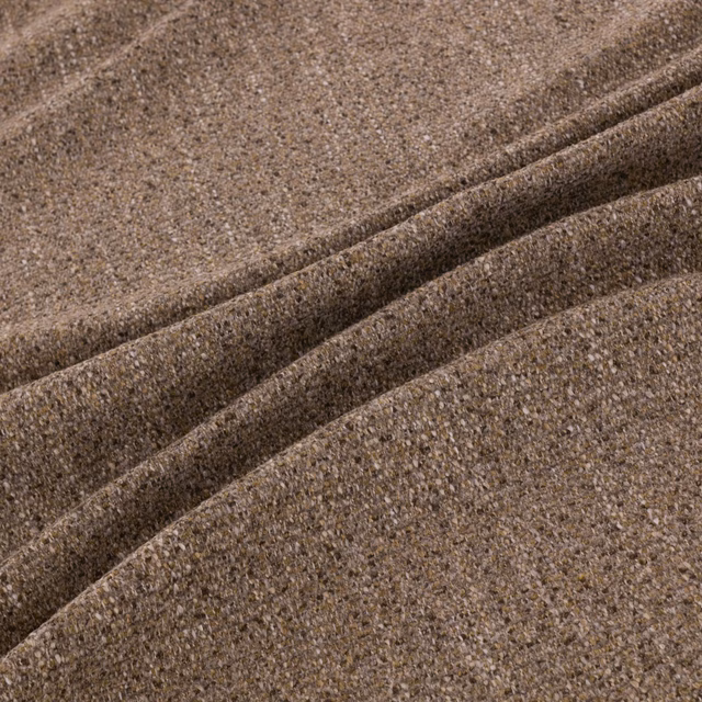 Mottled taupe-brown woven upholstery fabric with a nubby flecked texture in folded swatch
