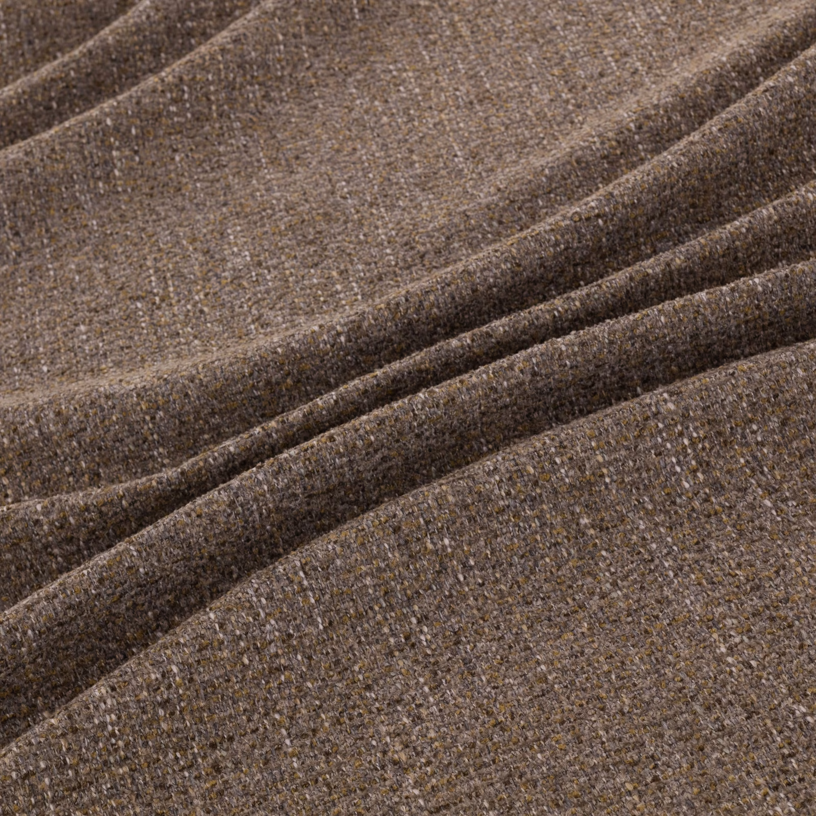 Warm ember-brown flecked upholstery weave gathered into soft overlapping folds