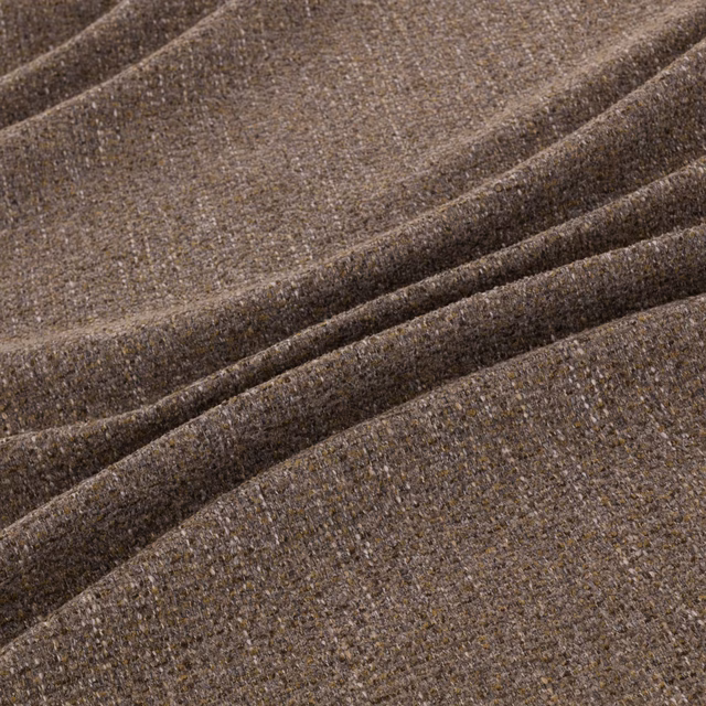 Warm ember-brown flecked upholstery weave gathered into soft overlapping folds