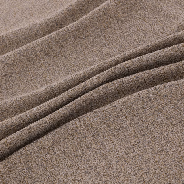 Warm taupe-grey woven upholstery fabric with fine flecks and deep folded texture