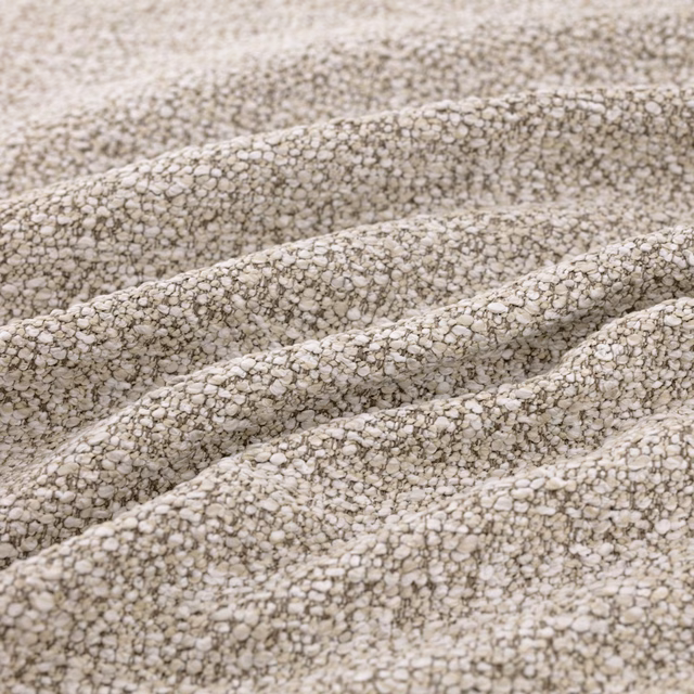Warm biscuit looped weave with cream texture and taupe flecks in folded ridges