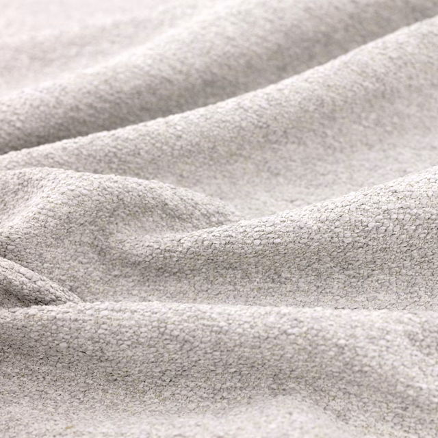 Pale greige Atlas Cocoon fabric with dense nubby weave draped into soft folds