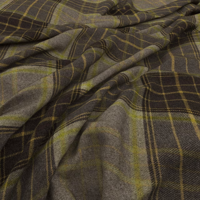 Charcoal olive plaid fabric with lime lines and a softly textured woven surface