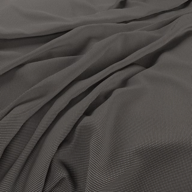 Deep charcoal grey micro-patterned fabric gathered into soft, fluid folds