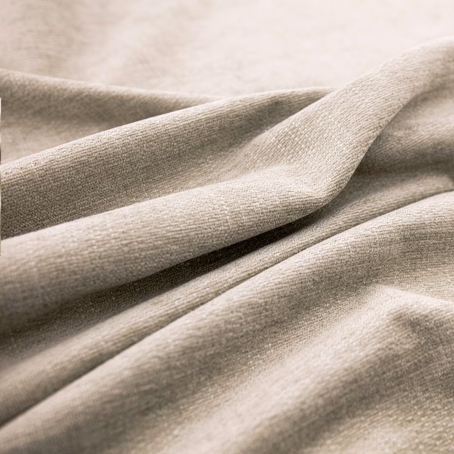 Warm pale taupe woven fabric draped in softly shadowed folds