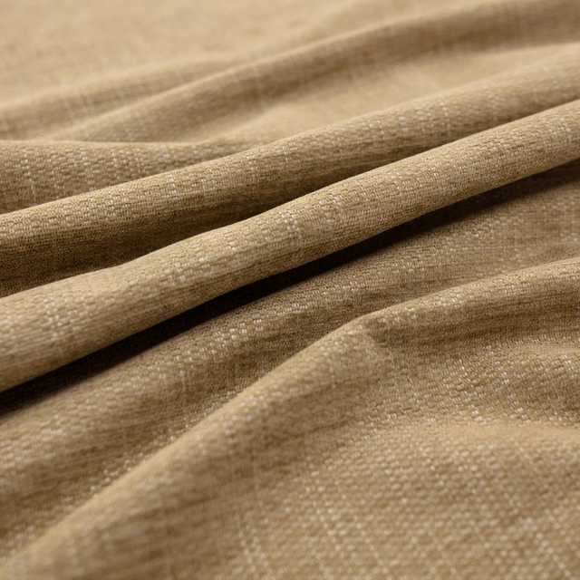 Warm taupe Bergamo Pesto fabric with fine woven texture in layered folds