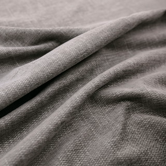 Close-up of Shadow grey fabric showing a fine, softly pebbled woven surface