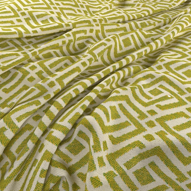 Lime-green maze pattern woven across warm ivory fabric in soft folds