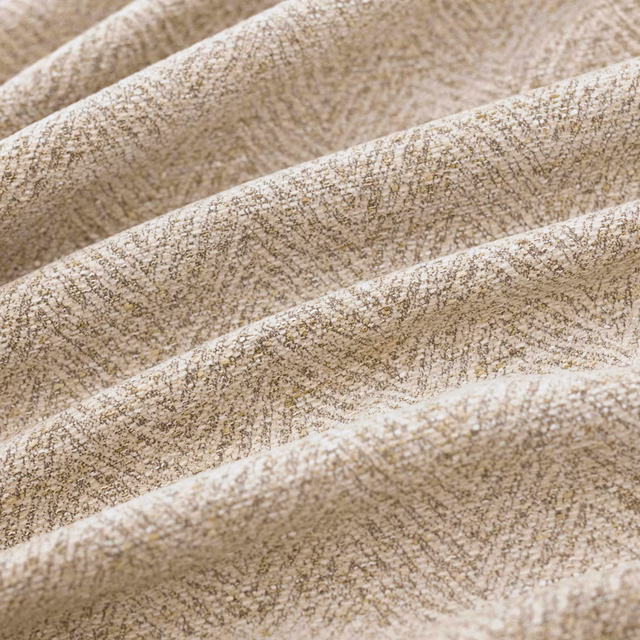 Warm ecru textile with fine crosshatched weave draped in soft folds