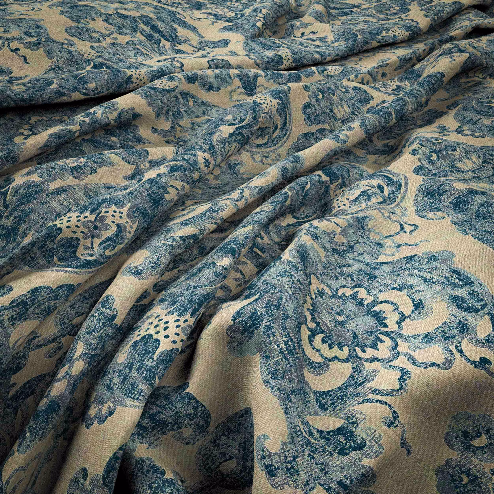 Teal and beige Persian floral fabric with paisley motifs in soft folds