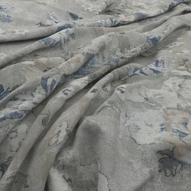 Cool grey woven fabric with muted indigo botanical flowers and trailing stems