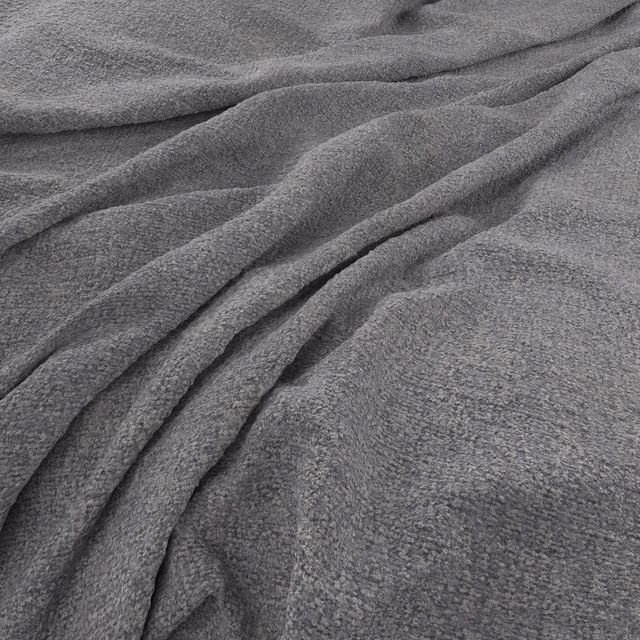 Mottled mid-grey fabric with a softly napped texture draped in deep folds