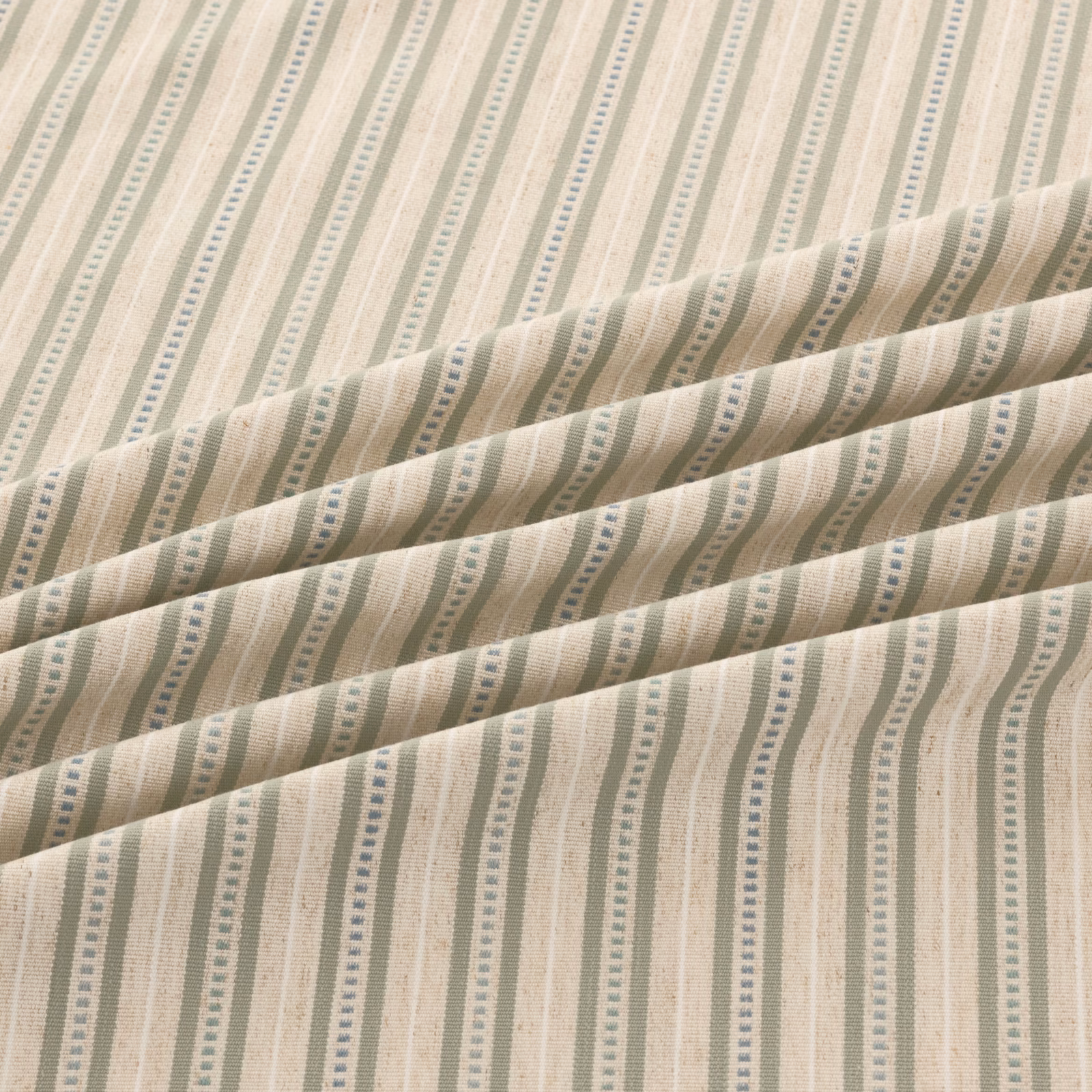 Cream and beige wavy vertical stripes with muted sage-grey dotted accents in woven texture