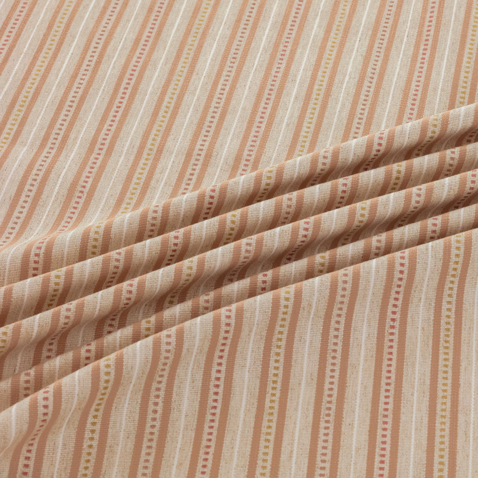 Warm cream woven fabric with dusty terracotta and beige pinstripes, folded