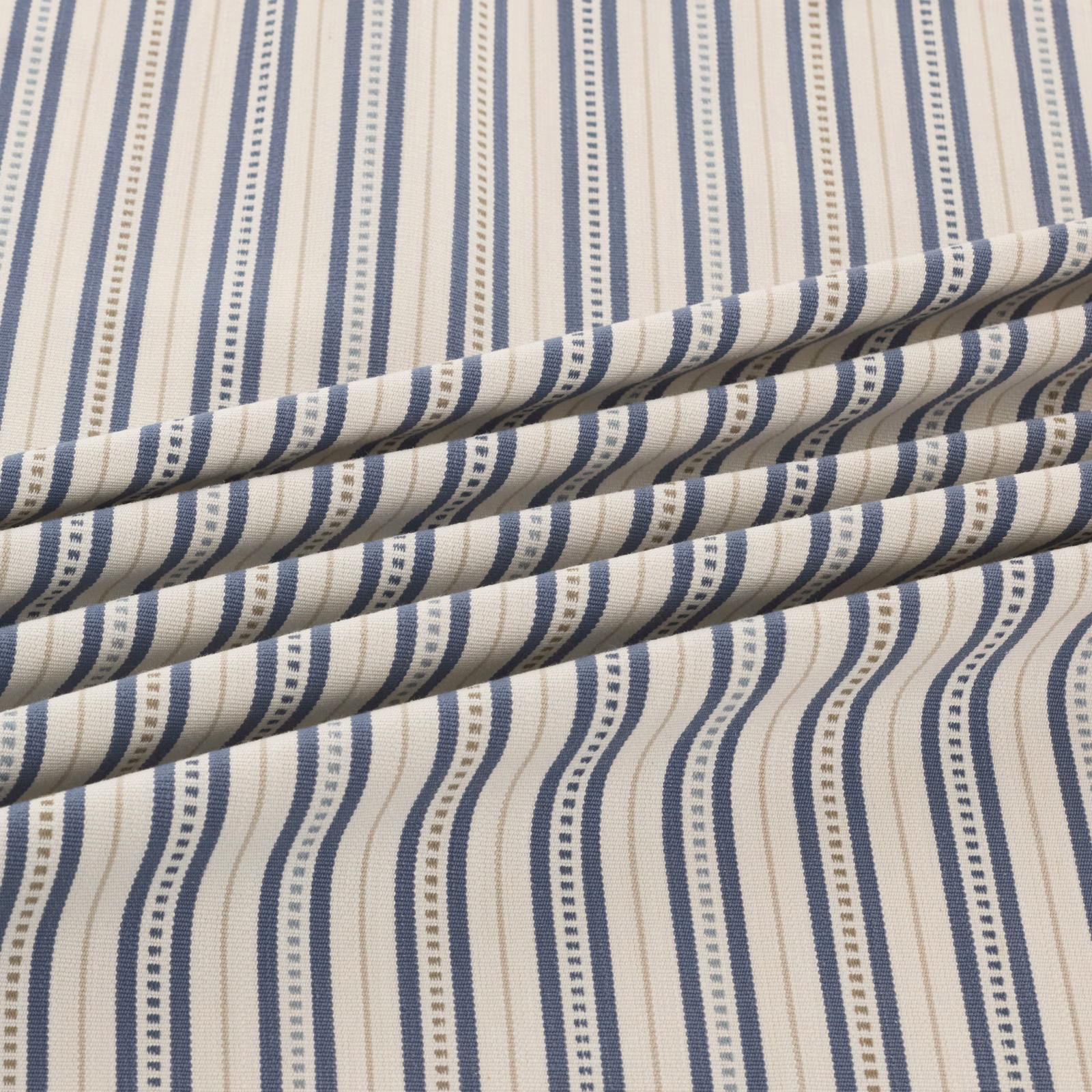 Cream and navy woven stripes with dotted bands shown in a folded swatch