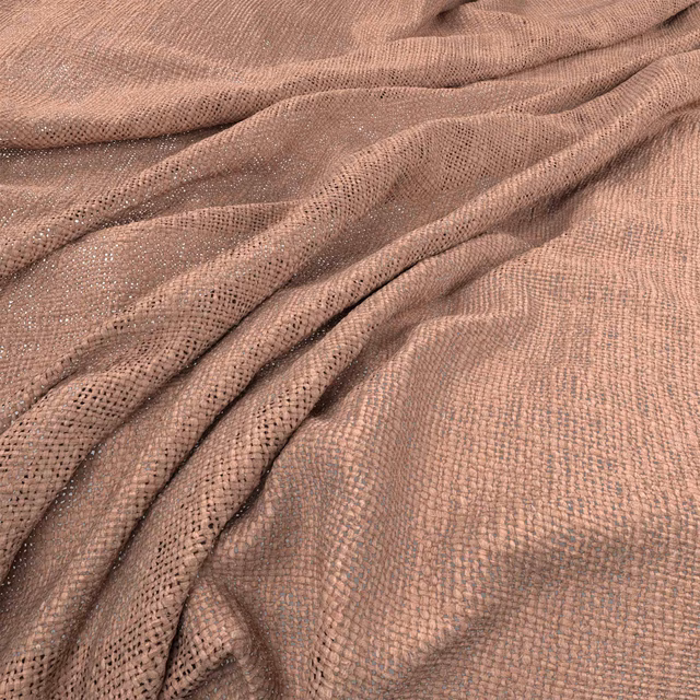 Dusty blush-pink woven fabric showing open texture and softly draped folds