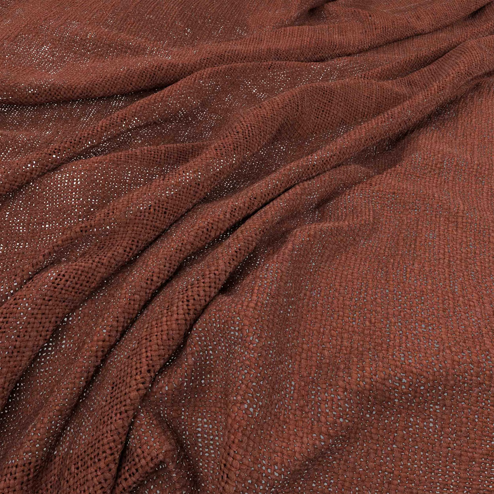 Deep brick-red woven fabric with nubby open texture arranged in soft folds