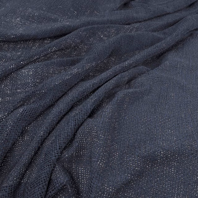 Deep ink-blue fabric with fine open weave gathered into softly shaded folds