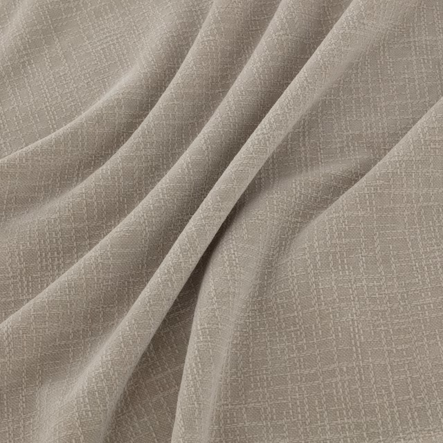 Pale dove-grey woven textile with a fine irregular checked surface in soft folds