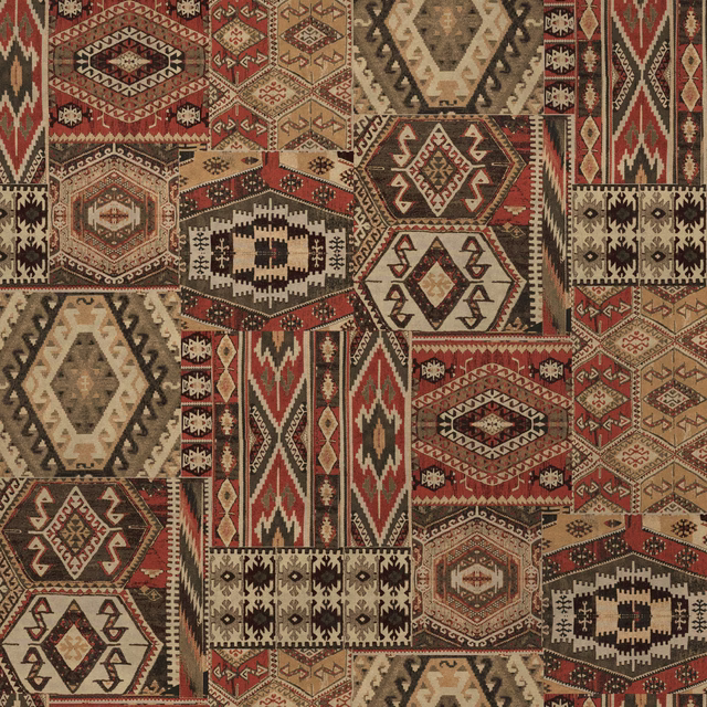 Patchwork geometric fabric in terracotta, beige and brown with bold tribal motifs