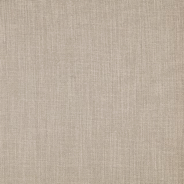 Close-up of a soft flax-beige plain weave fabric with fine linen-like texture