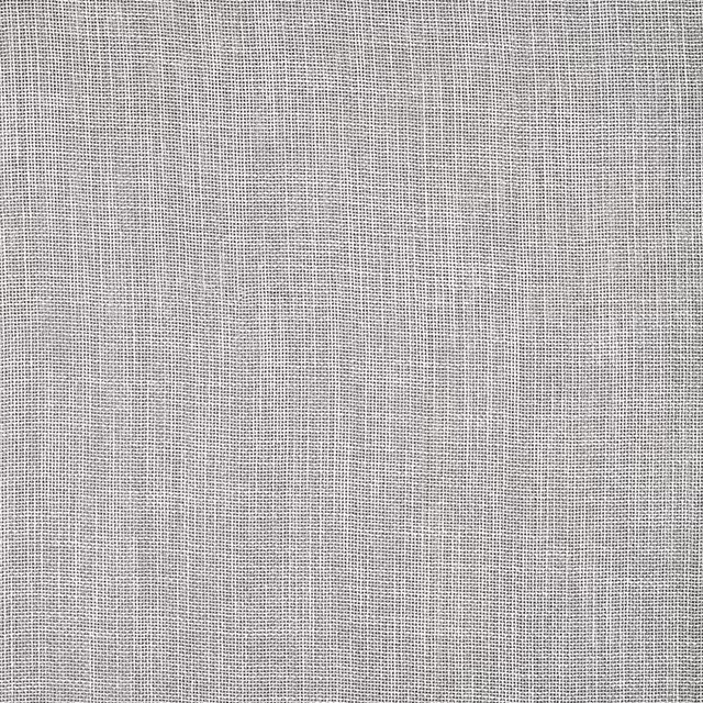 Close-up of pale glacier-grey plain weave fabric with a fine, even texture