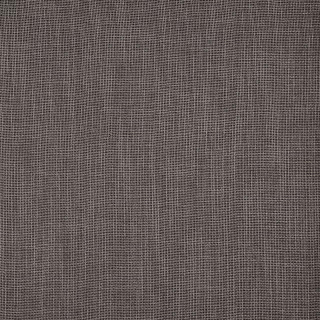 Close-up of Calais Lead fabric in soft mushroom taupe, showing a fine plain weave